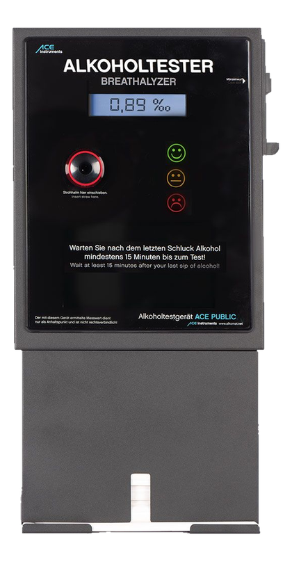 Alkoholtester ACE Public: schwarzes Gerät mit Display, Strohhalm-Mundstück und Smiley-Ampel, darunter die Strohhalmbox